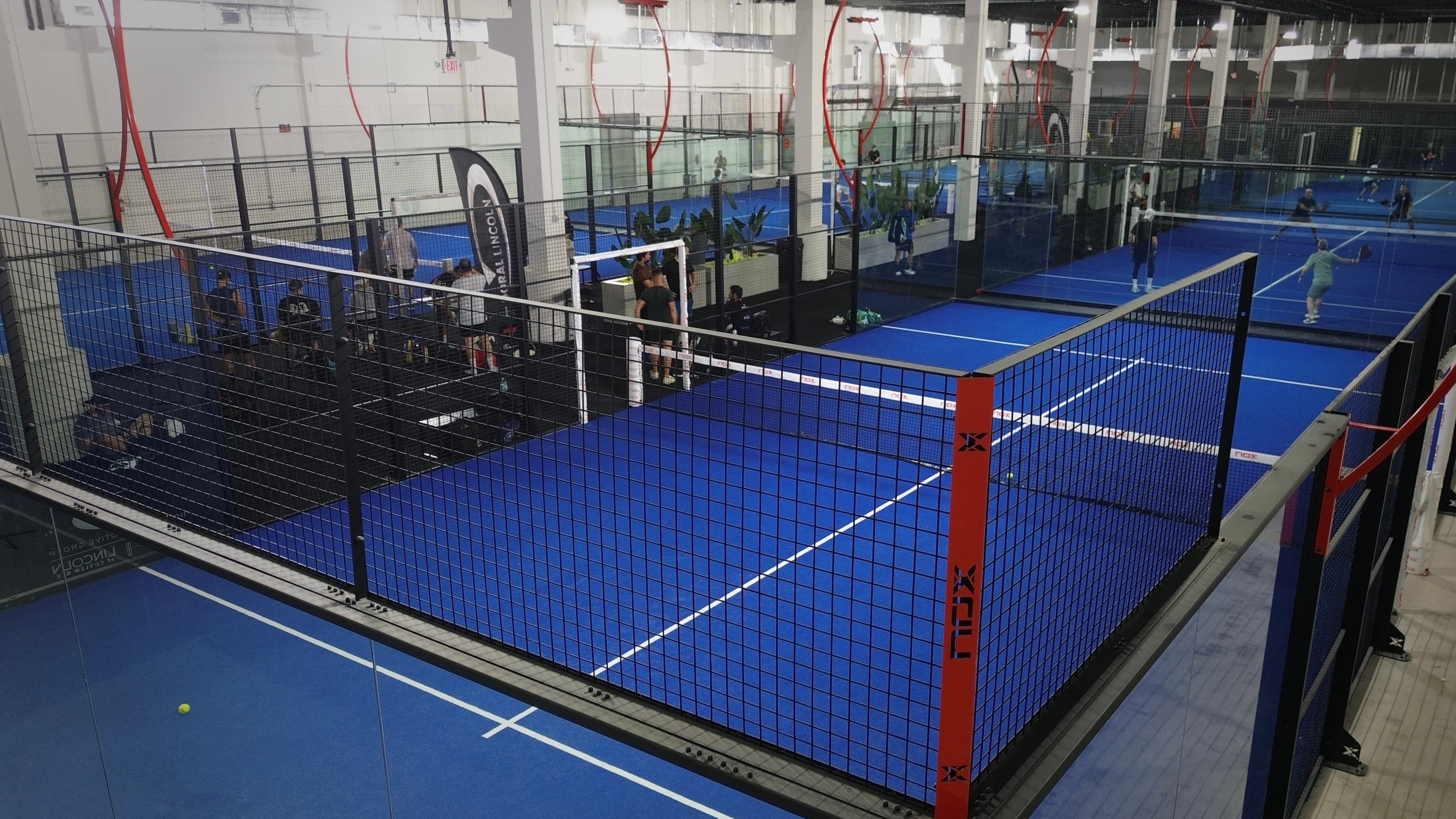 Indoor padel courts at Ola Clubs in Doral, Miami