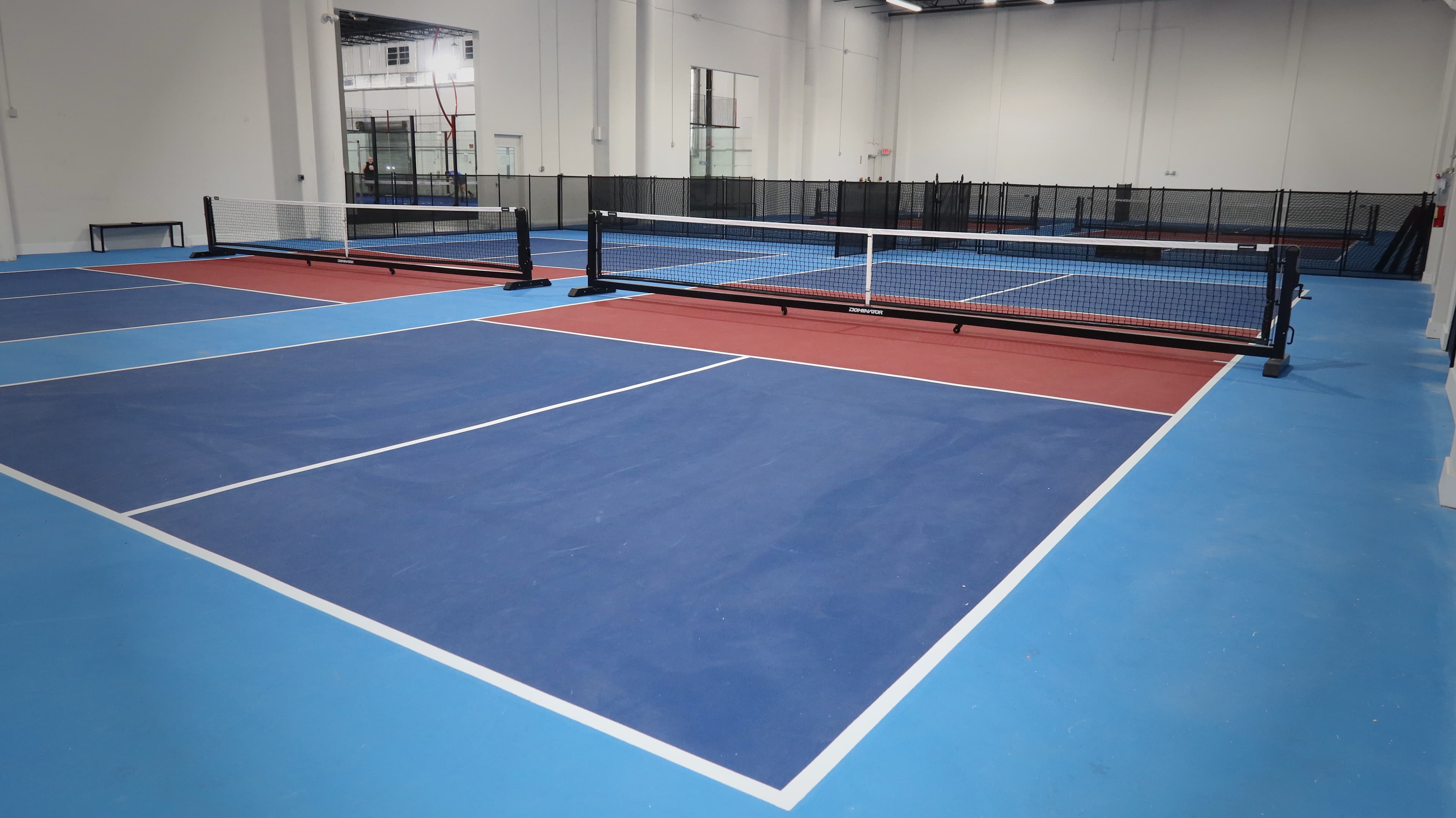 Indoor pickleball courts at Ola Clubs in Doral, Miami
